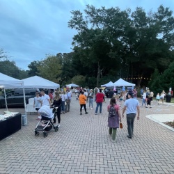 Market goers enjoying the evening