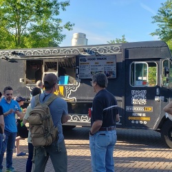 People in front of food truck